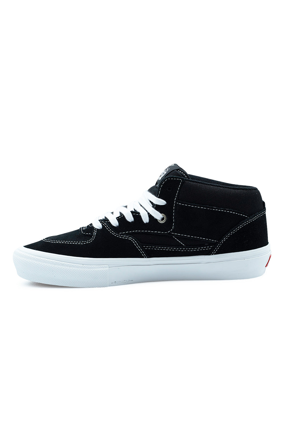 Medial arch view of the Vans Skate Half Cab shoe in black and white, detailing the inner canvas side panel, white accent stitching across the suede overlays, embossed Duracap logo lettering along the rubber foxing wrap, and clean white vulcanized sole sidewall.