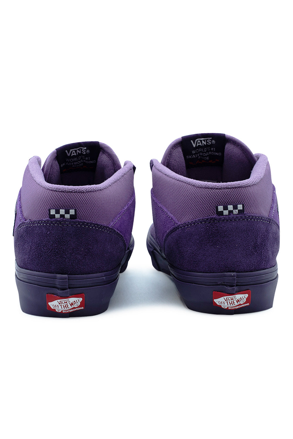 Rear view of the heels of the Vans Skate Half Cab sneakers in Purple Licorice, showing the padded two-tone purple ankle collars, black and white checkerboard flag tags, vertical suede heel counters, and red rubber Vans Skateboarding Off The Wall license plates on the dark purple foxing tape.