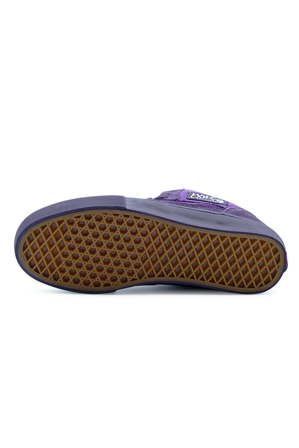 Full bottom view of the gum rubber vulcanized outsole on the Vans Skate Half Cab shoe, featuring the proprietary SickStick waffle tread pattern engineered for maximum skateboard grip, durability, and direct board feel.