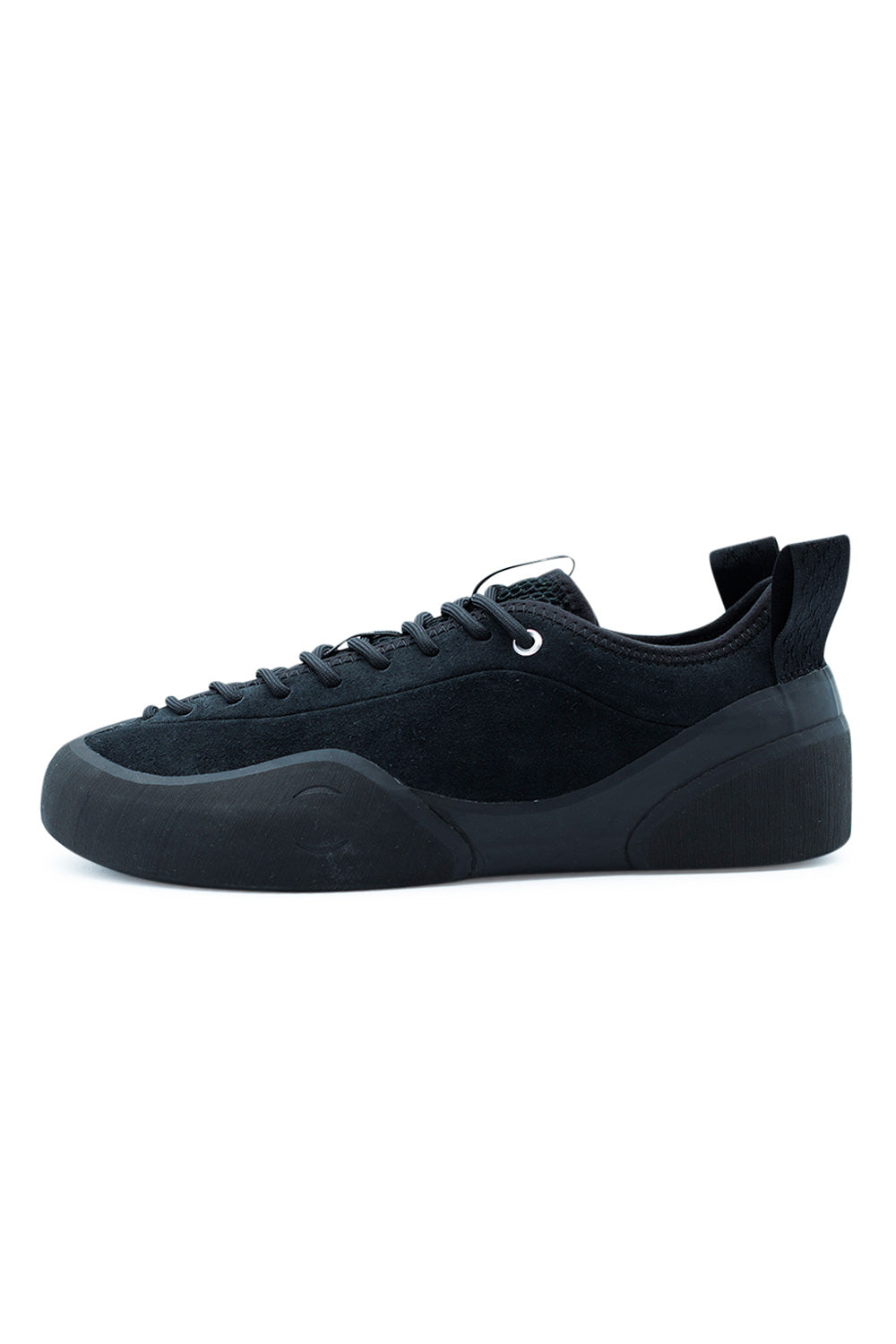 Village PM 1PM Black Natural Black skateboard shoe side view featuring premium suede upper, Rubber Glove Technology construction and minimalist all-black skate sneaker design