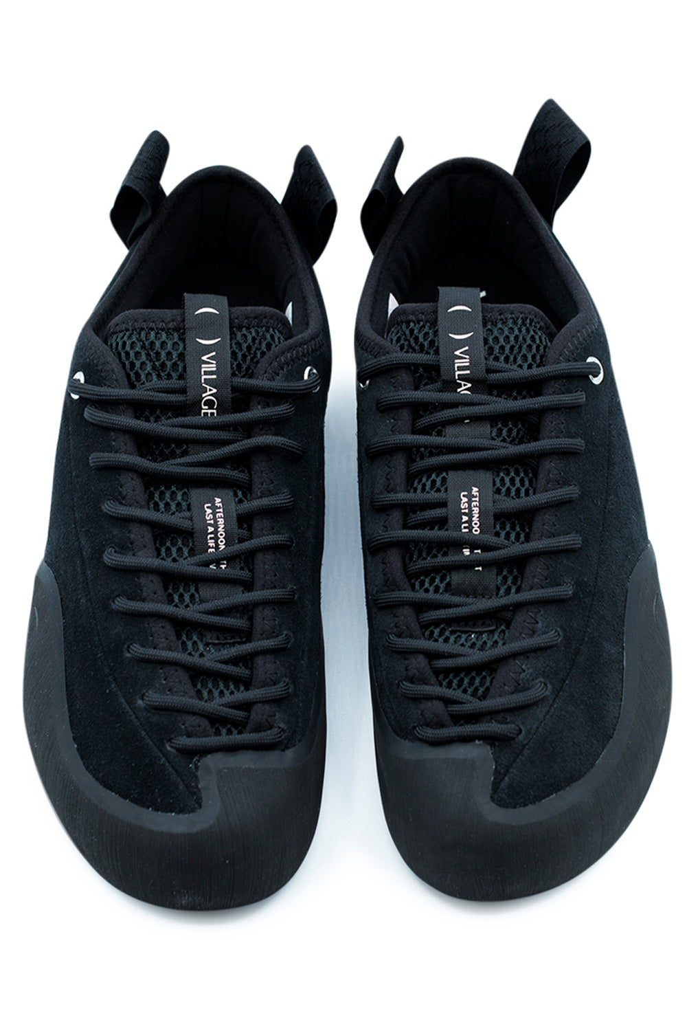 Top view of Village PM 1PM Black Natural Black skate shoe with full foot lacing system, breathable mesh tongue and asymmetrical precision fit for optimal skateboard control