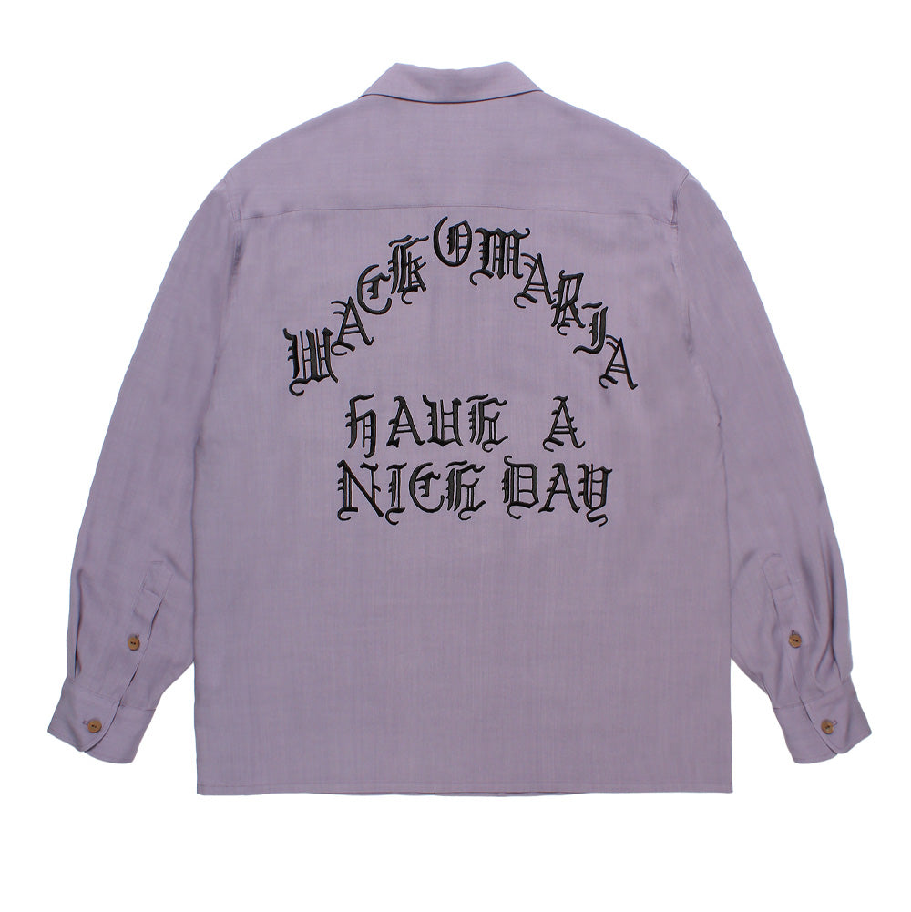 Back flat lay studio view of the Wacko Maria 50's Shirt Long Sleeve Type 3 in muted lavender purple, displaying the relaxed rockabilly boxy cut, straight back shoulder yoke, straight hemline, double-button barrel cuffs, and an arched black gothic Old English embroidery reading "WACKO MARIA HAVE A NICE DAY" across the upper back.