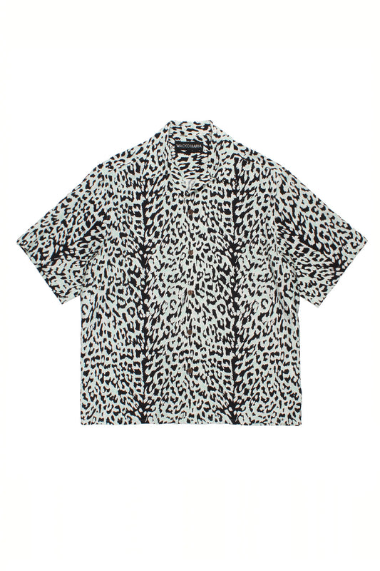 Full front view of the Wacko Maria wide-fitted short sleeve Hawaiian shirt in ivory, featuring an all-over abstract animal print in black with subtle mint green undertones.