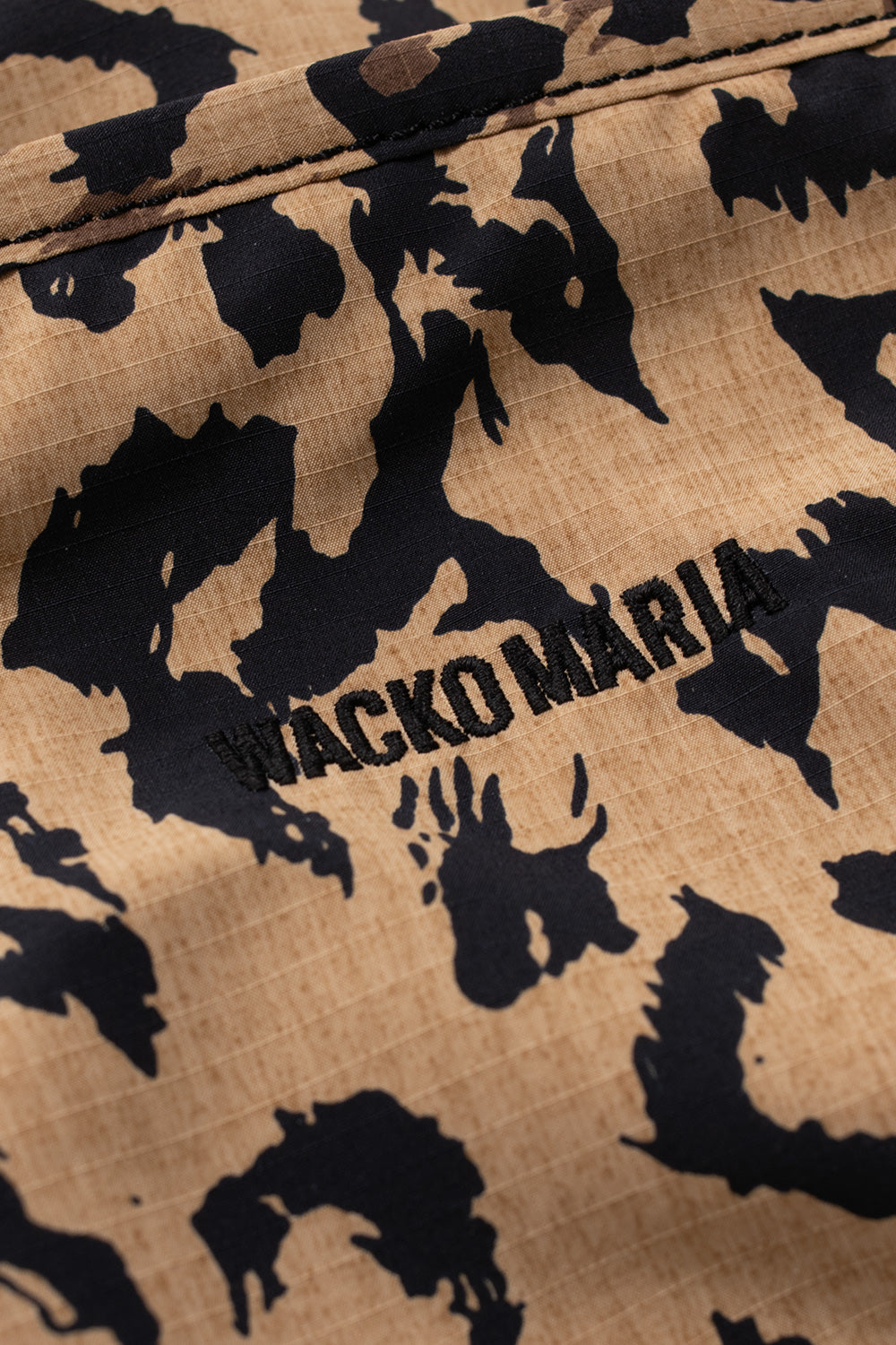 Close-up embroidered Wacko Maria logo on leopard pattern Speak Easy shoulder bag, soft ripstop fabric luxury streetwear bag with YKK zipper detailing