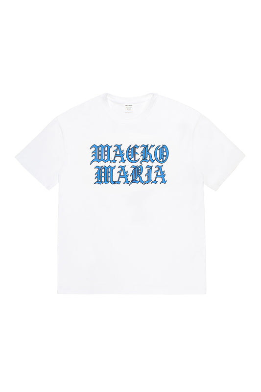 Front view of the Wacko Maria Washed Heavy Weight Crew Neck T-Shirt in White featuring a blue Gothic-style brand logo printed on the chest.