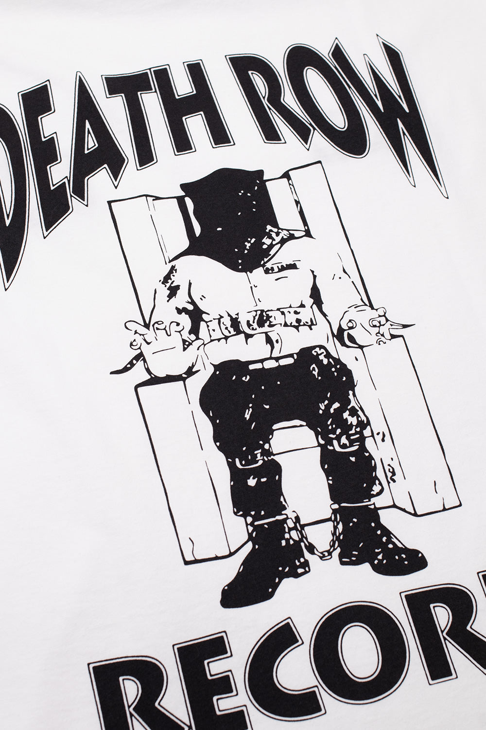 Close-up detail of the iconic black printed Death Row Records electric chair logo on the back of the white cotton t-shirt.
