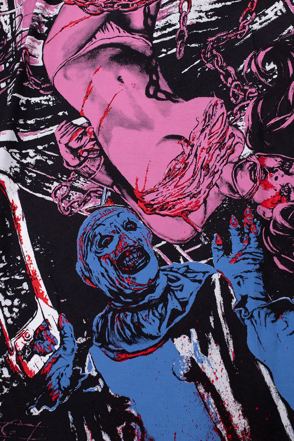 Close-up of Art the Clown print on Wacko Maria x Terrifier shirt, striking horror imagery with bold colors, premium Japanese-made rayon summer shirt with all-over design