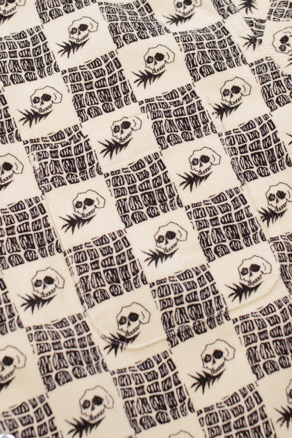 Wacko Maria x Wolf’s Head short sleeve shirt pocket detail with all over skull and abstract pattern, relaxed wide fit silhouette and premium made in Japan cotton construction