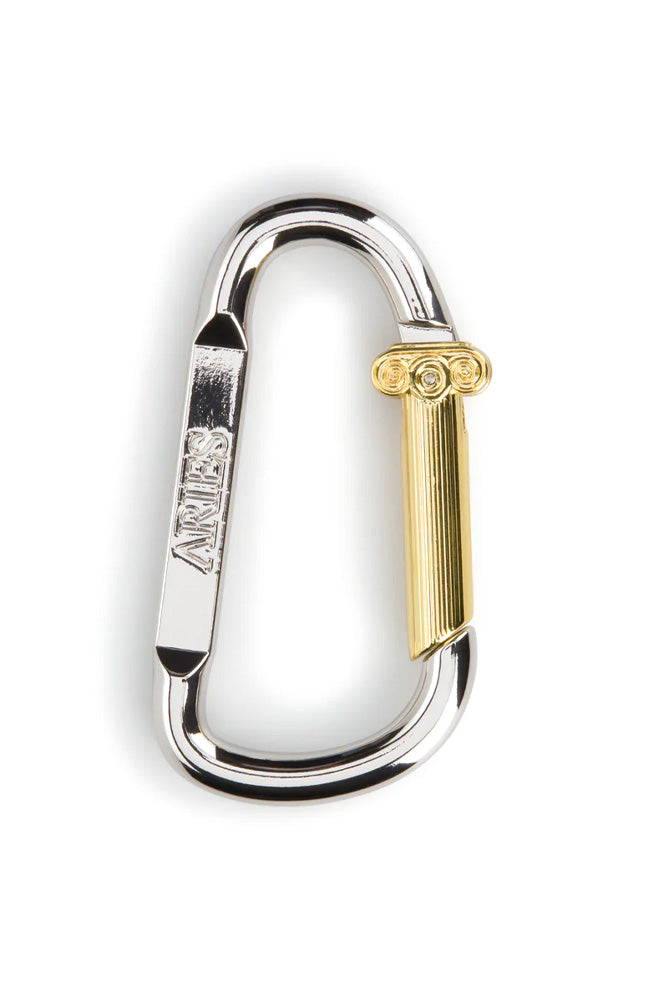 "Aries Column Carabiner in Silber und Gold – hochwertiger Karabiner mit antiker Säulen-Ästhetik"